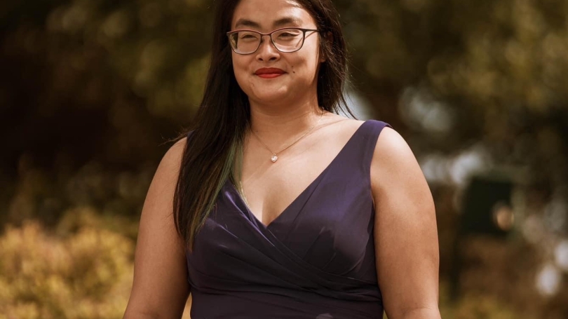 amanda in a purple dress outside 